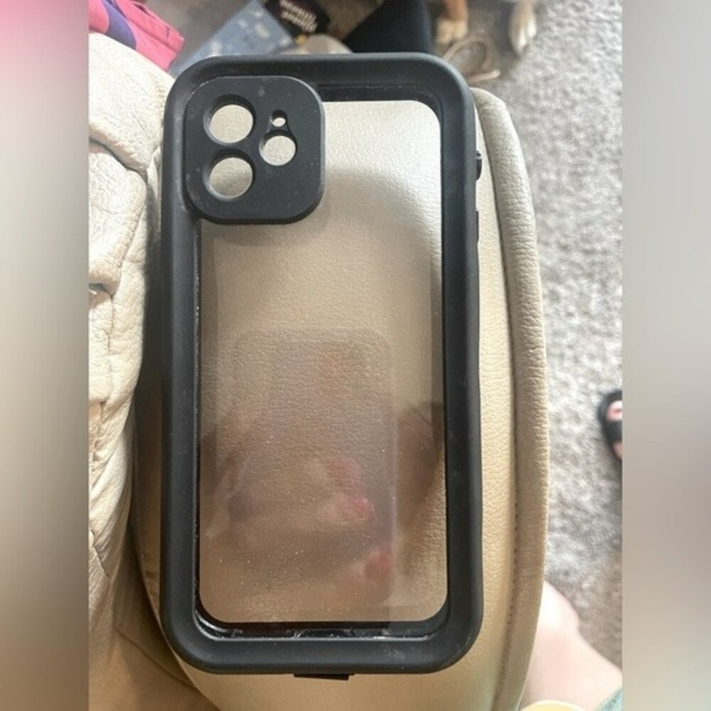 IPhone 12 case black in color good condition